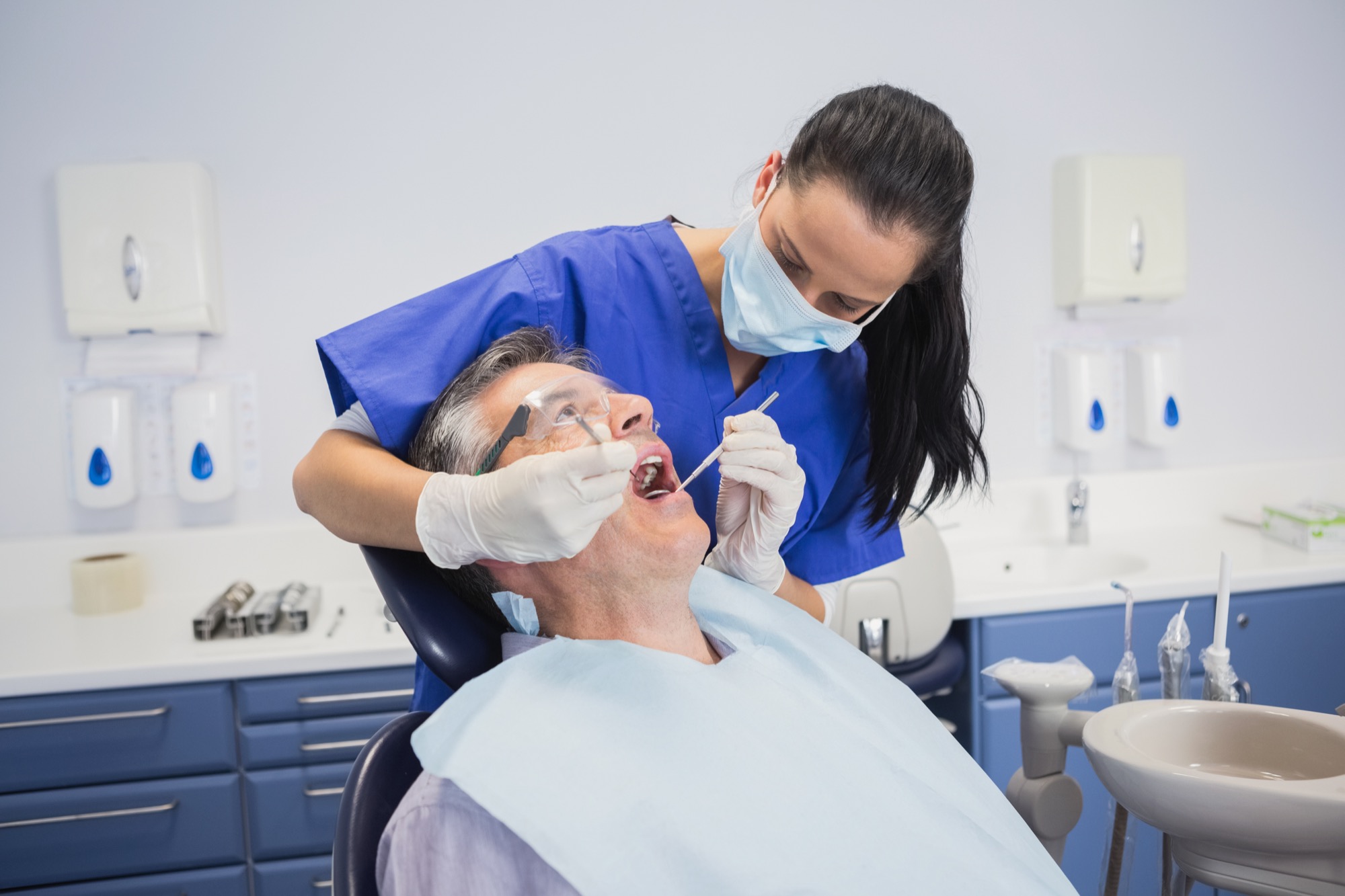 Dentist with patient