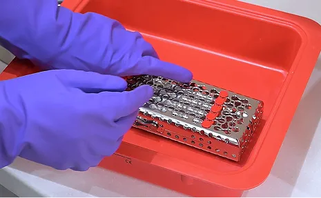 Dental instruments being processed in IMS cassette system