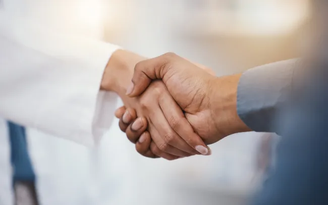 Dental compliance consultant working with a dental practice team