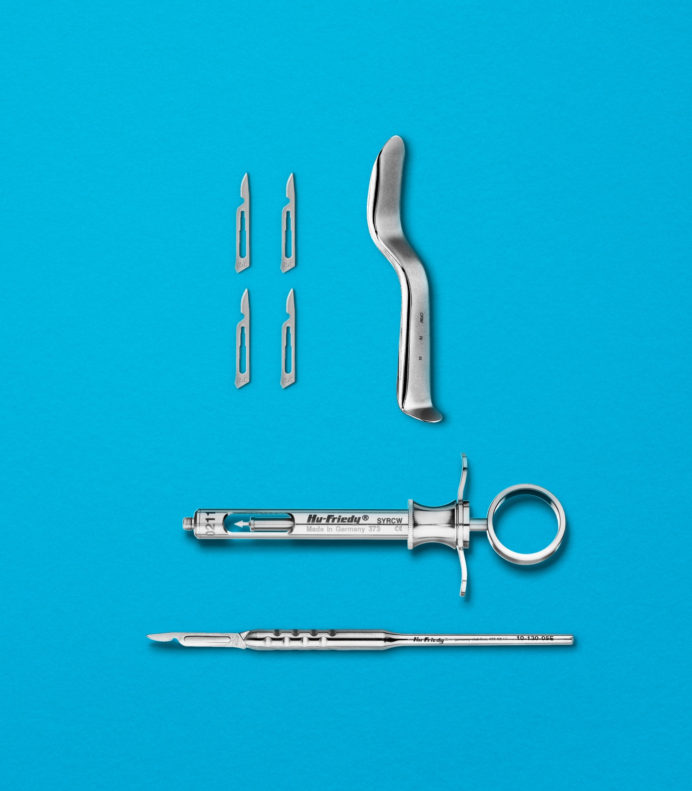 Hu-Friedy surgical scalpel blades, aspirator and syringe